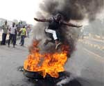 West Africa burning | by Amandla! Correspondent