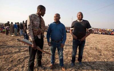 Cops distance themselves as Lonmin miners welcome Malema